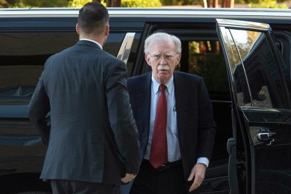 John Bolton surrenders to face charges of sharing classified information