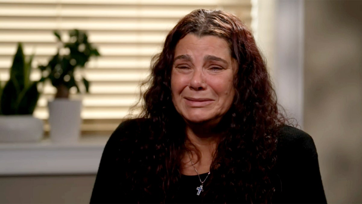 Foulla Niotis cries during an exclusive interview.