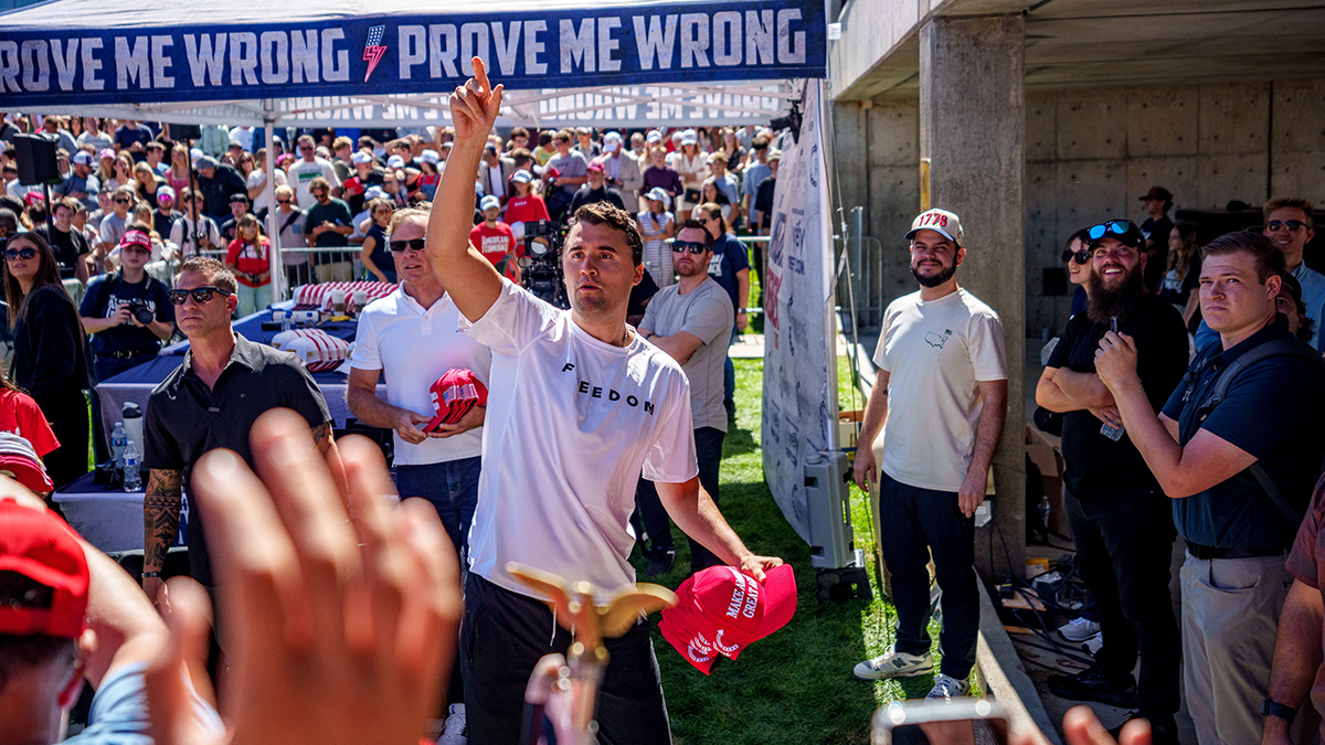 Charlie Kirk tosses hats to audience members at UVU shortly before his assassination