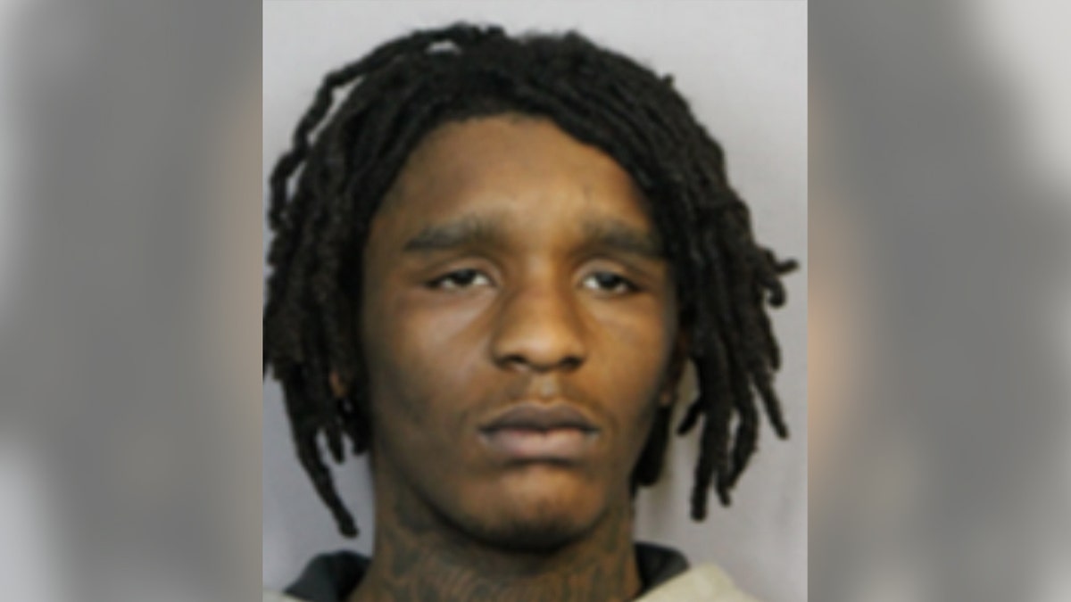 Naqwan Lucas poses for a booking picture