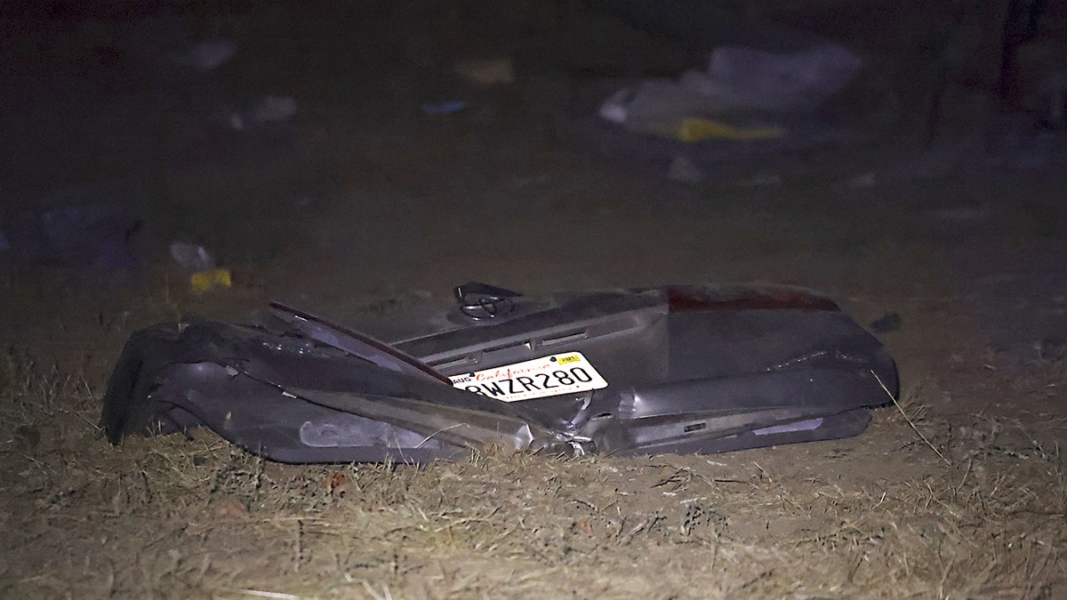 Debris after car with drunk deported driver Norberto Celerino.