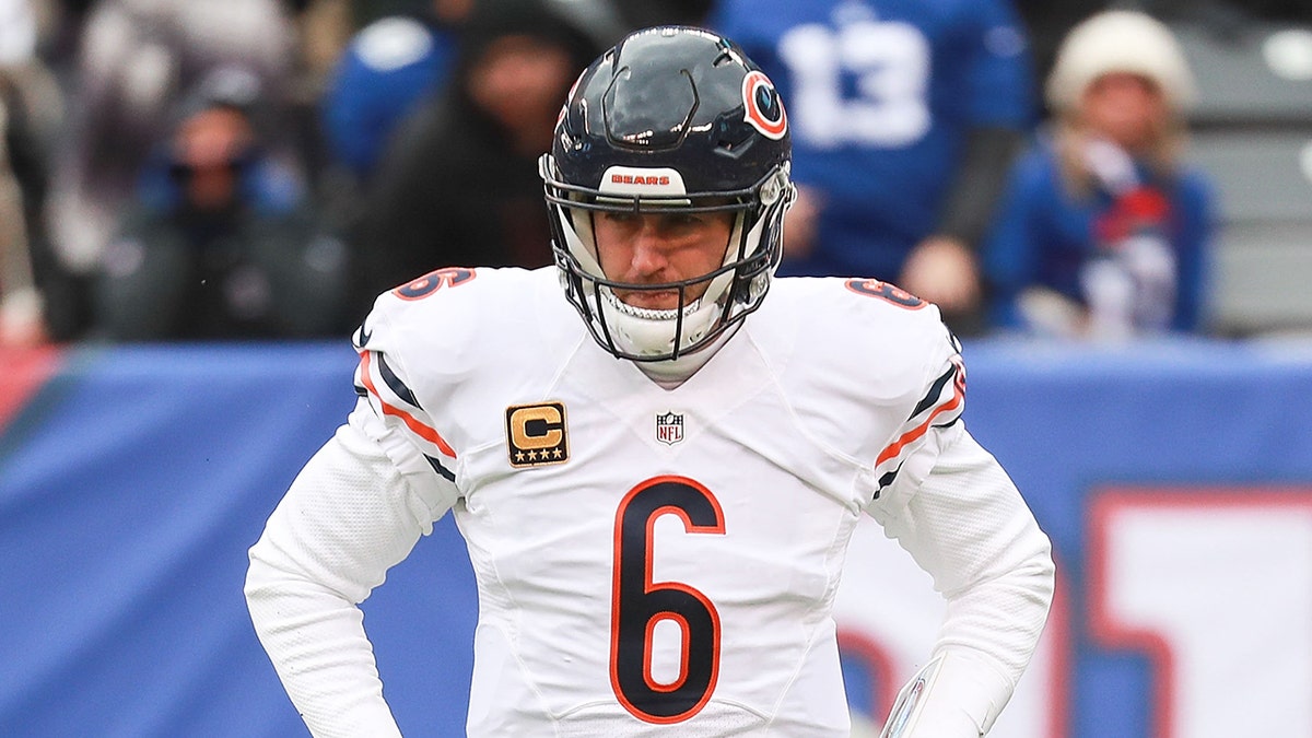 Jay Cutler looks on MetLife Stadium field