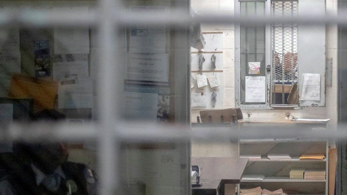 Jail guard sits inside control room at Kirkland Correctional Institution