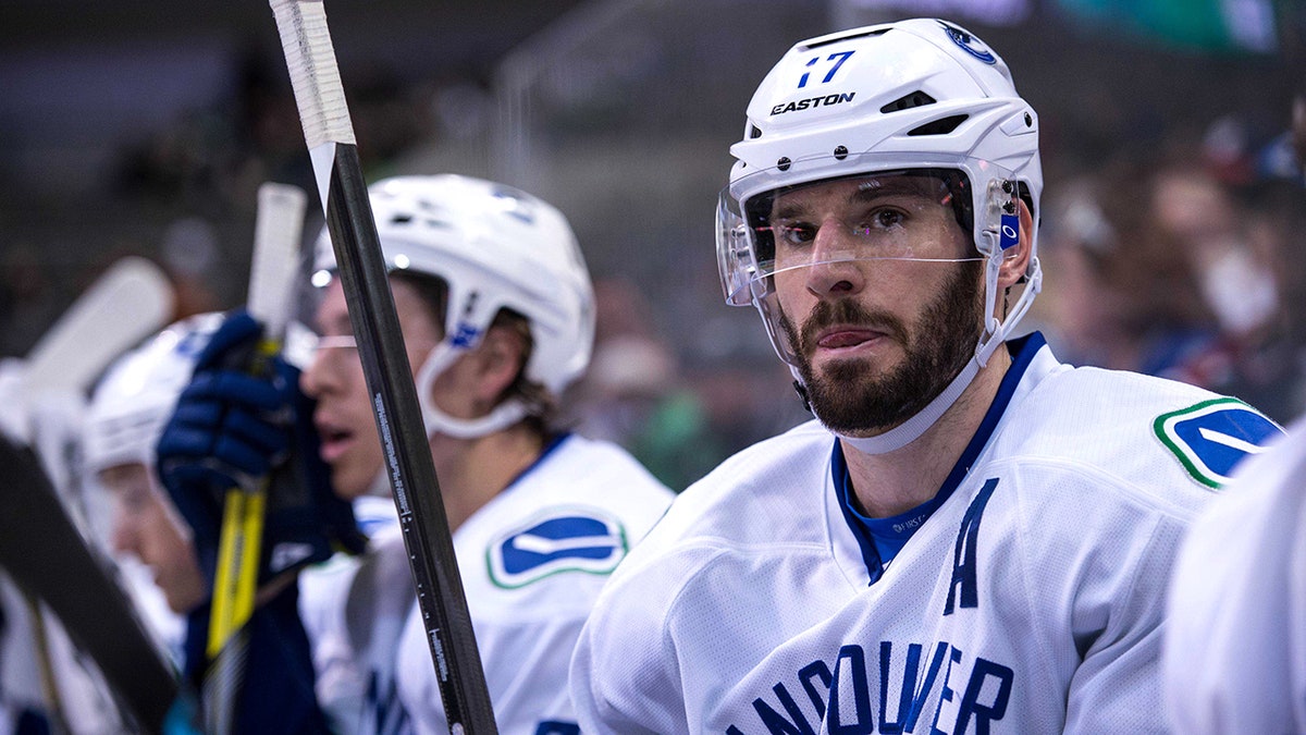 Ryan Kesler sits on the Vancouver bench