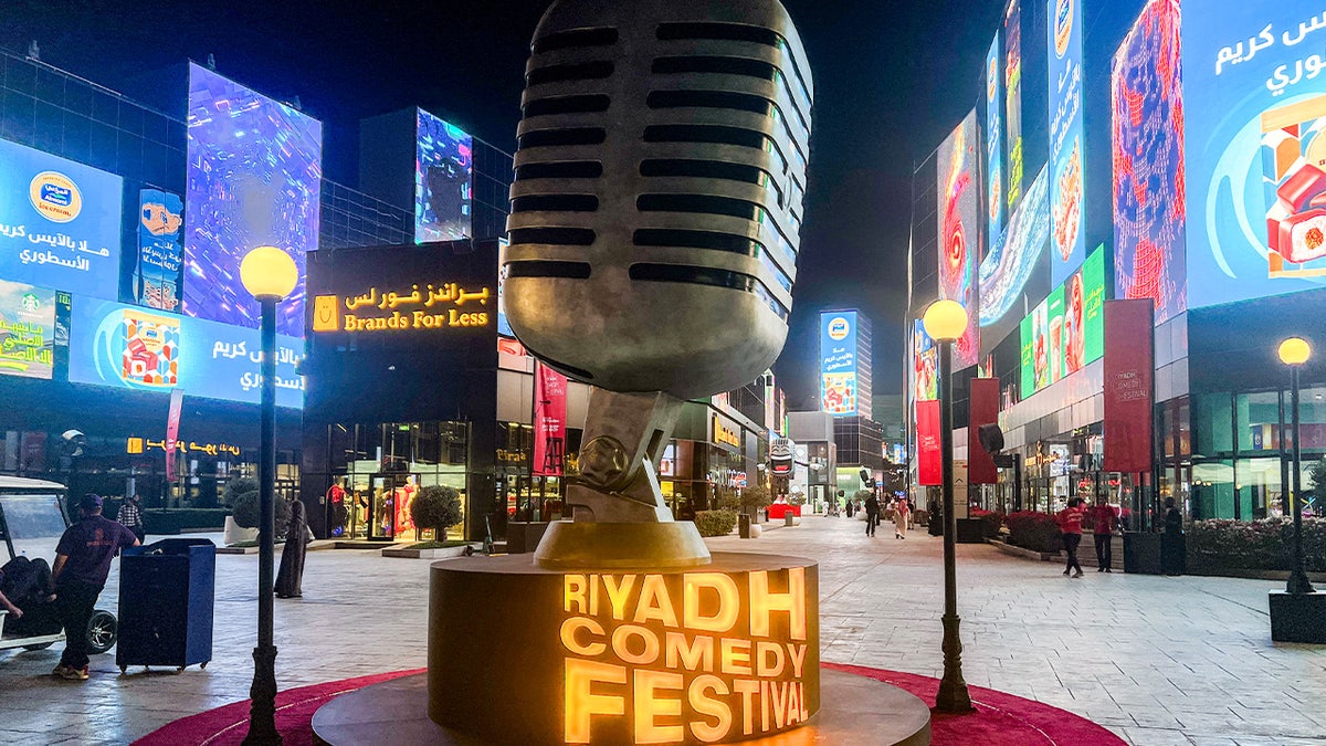 A sign showcasing the Riyadh Comedy Festival in Saudi Arabia