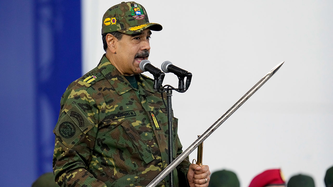 Maduro brandishes sword at rally as he rails against ‘imperialist aggression’ amid rising tensions with US