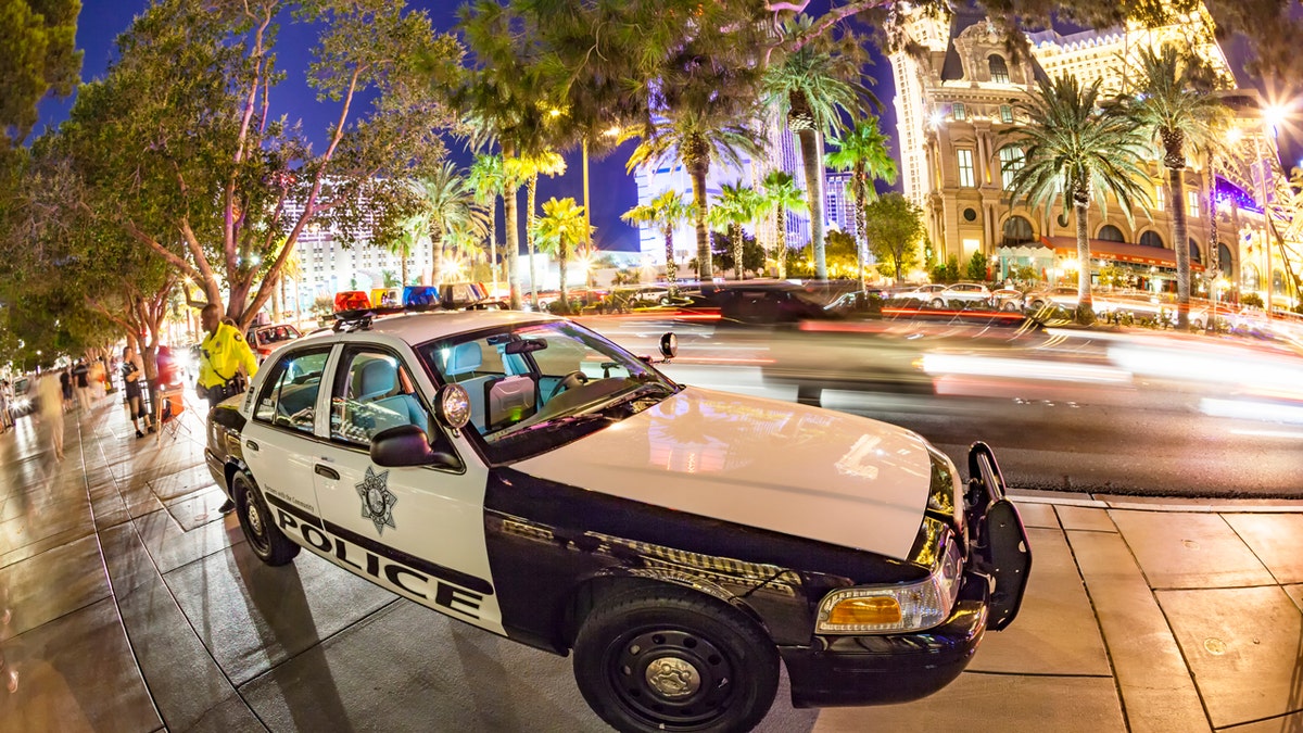 las vegas police car on strip at night 