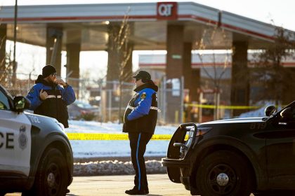 Omaha bystander flees gas station bathroom moments before armed man fires on officers