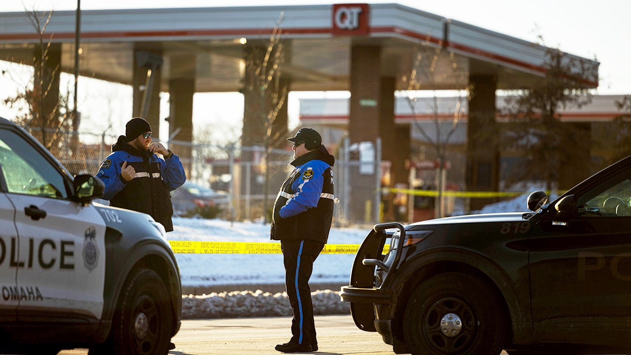 Omaha bystander flees gas station bathroom moments before armed man fires on officers