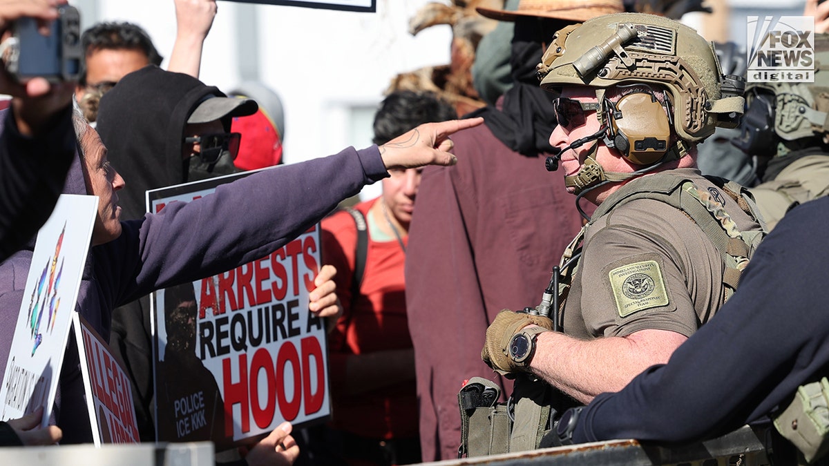protesters confront federal agents outside an arizona taco restaurant