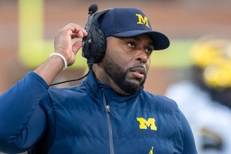Sherrone Moore ‘had long history of domestic violence’ against Michigan staffer, attorney alleges