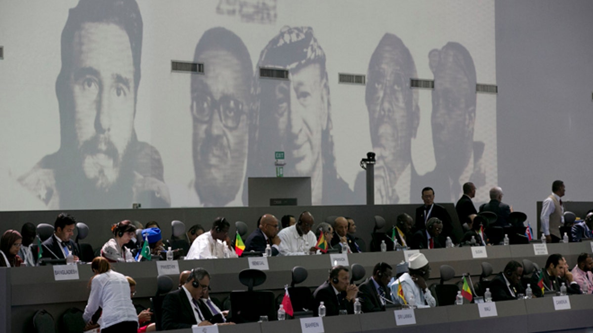 Attendees take part in the 17th Non-Aligned Movement Summit in Porlamar, Venezuela's Margarita Island, Saturday, Sept. 17, 2016. President Nicolas Maduro had touted the Non-Aligned Movement's 17th summit as an opportunity to increase international solidarity for his government as the oil-dependent economy reels from widespread food shortages and triple digit inflation. (AP Photo/Ariana Cubillos)