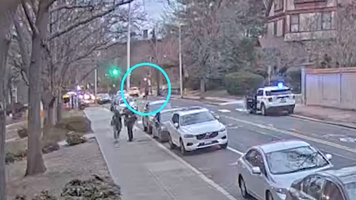 Alleged Brown University shooter walking past law enforcement