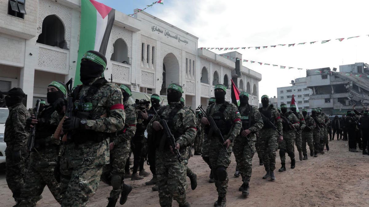 Hamas terrorists parade in Gaza.