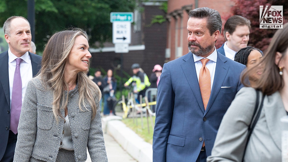 Karen Read and lawyer Alan Jackson outside court during her retrial facing murder charges in connection to the death of John O’Keefe.