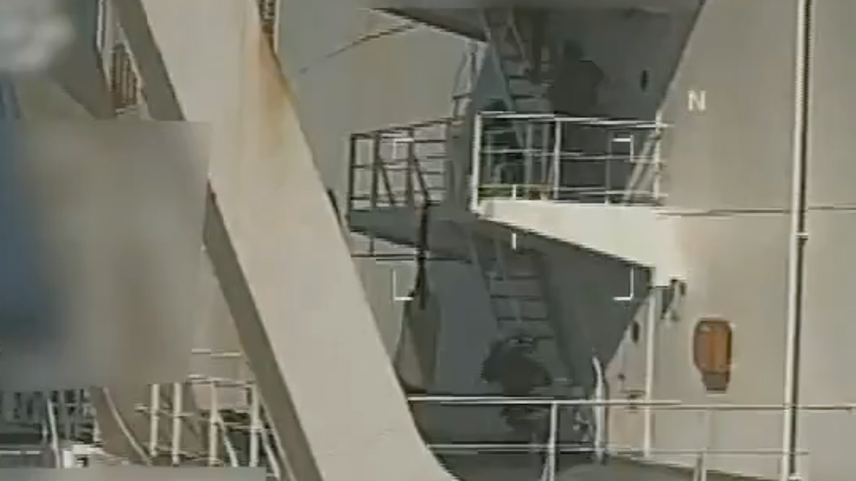 U.S. forces were seen climbing staircases on the ship.