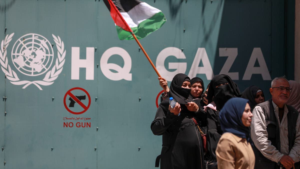 Palestinians protest outside the UNRWA in Gaza City