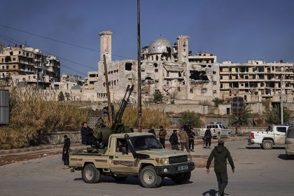 Turkey says Syria using force is an option against US-backed fighters who helped defeat ISIS