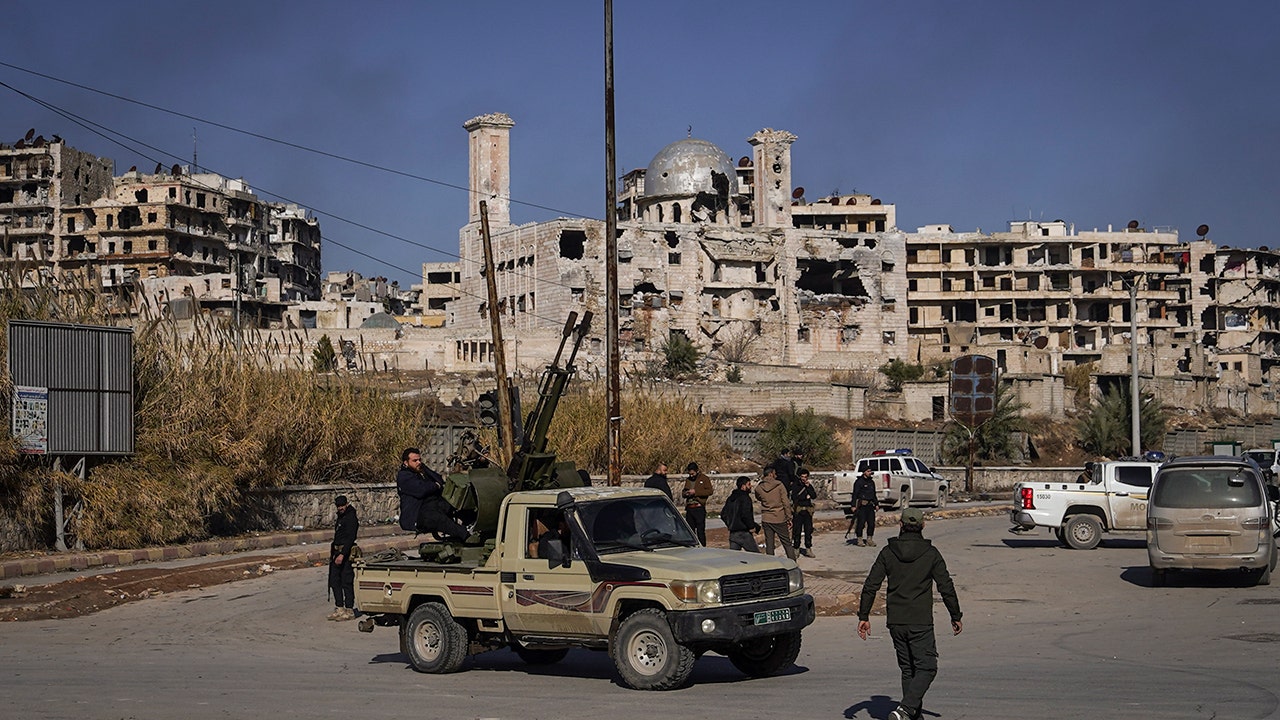 Turkey says Syria using force is an option against US-backed fighters who helped defeat ISIS