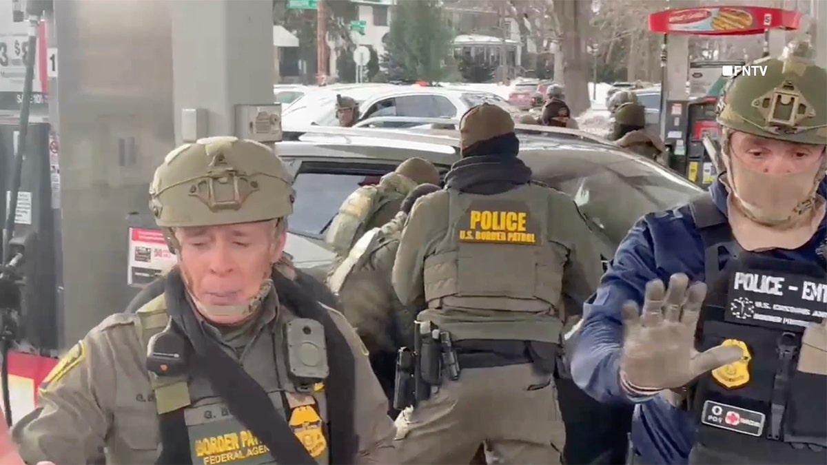 Border Patrol agents in a social media video at a gas station in St. Paul, Minnesota