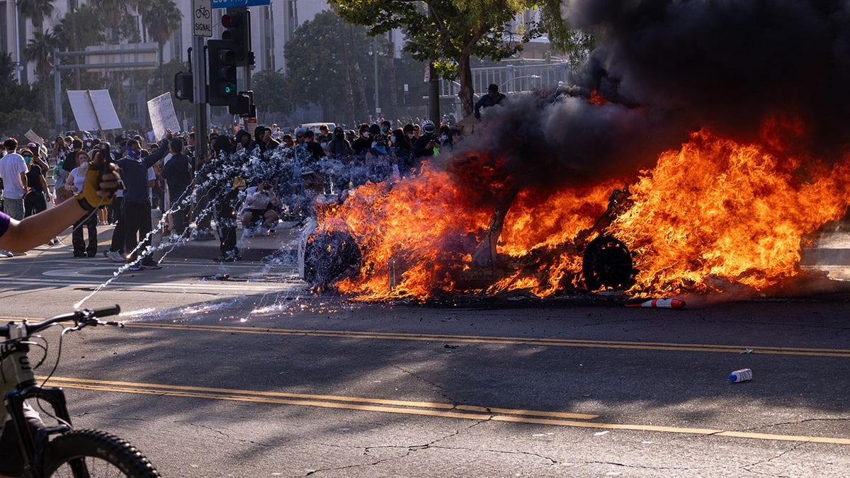 Car on fire at Los Angeles protest