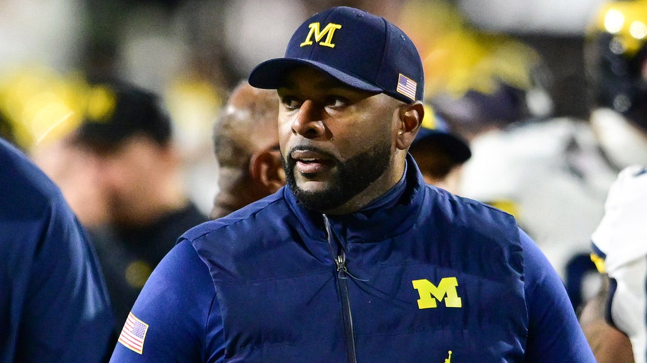 Fired Michigan coach Sherrone Moore’s wife heard saying ‘he said he is trying to kill himself’ in 911 audio