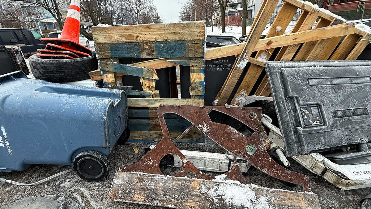 Location of ICE shooting barricaded by residents in Minneapolis