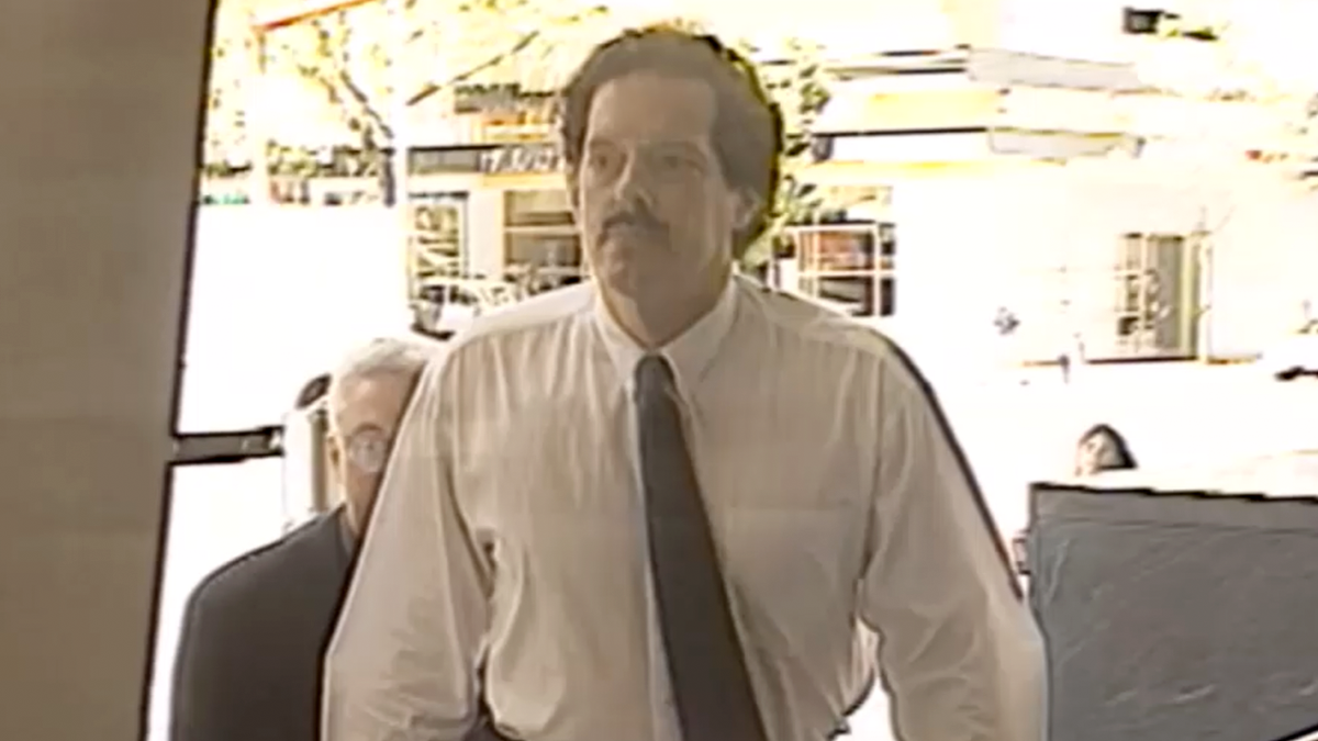 Larry Hurwitz enters a courthouse during a court appearance in an archival image