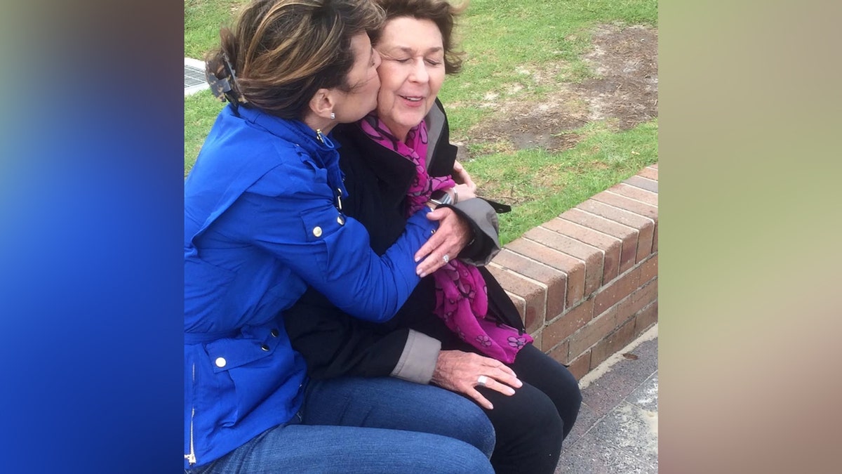 Savannah hugs Nancy Guthrie