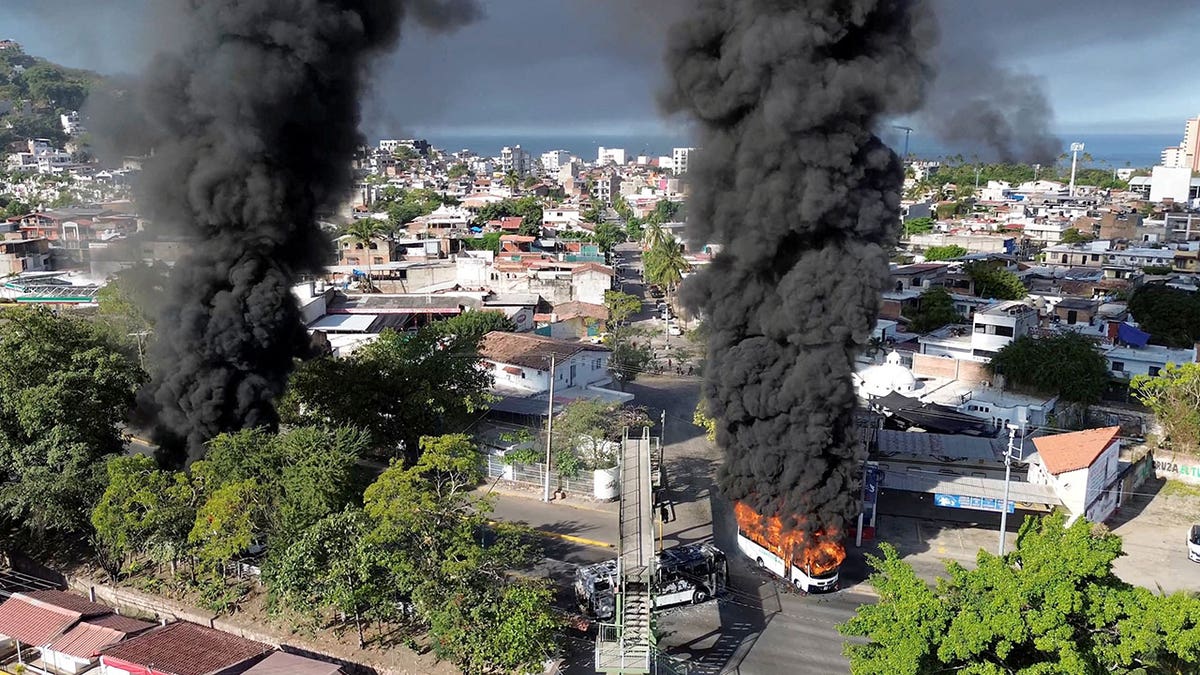 Smoke billows, following a military operation in which a government source said Mexican drug lord Nemesio Oseguera, known as "El Mencho," was killed, in Puerto Vallarta.