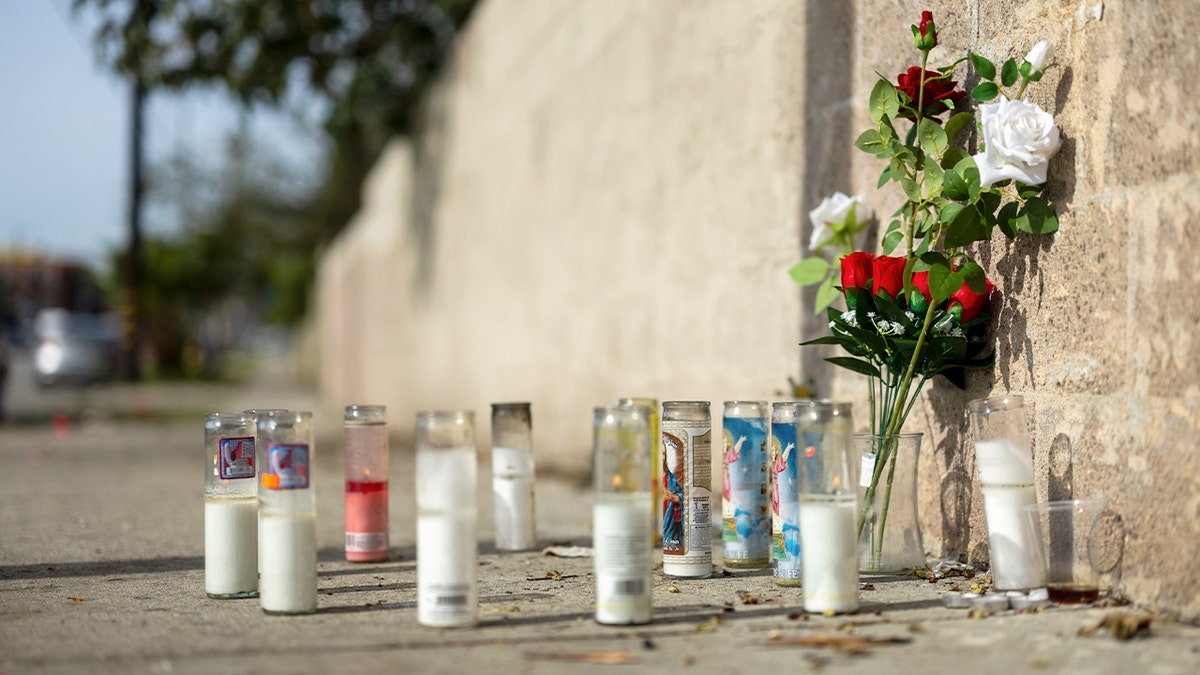 A memorial for former NFL and Westchester High lineman Kevin Johnson sits near a homeless encampment in Willowbrook on Sunday, Jan. 25, 2026 in Los Angeles, Calif.