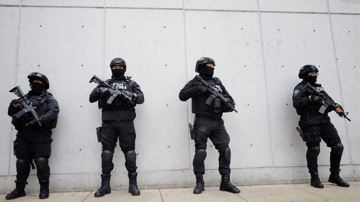 Mexican law enforcement stand guard on the heels of the death of Mexican drug trafficker "El Mencho."