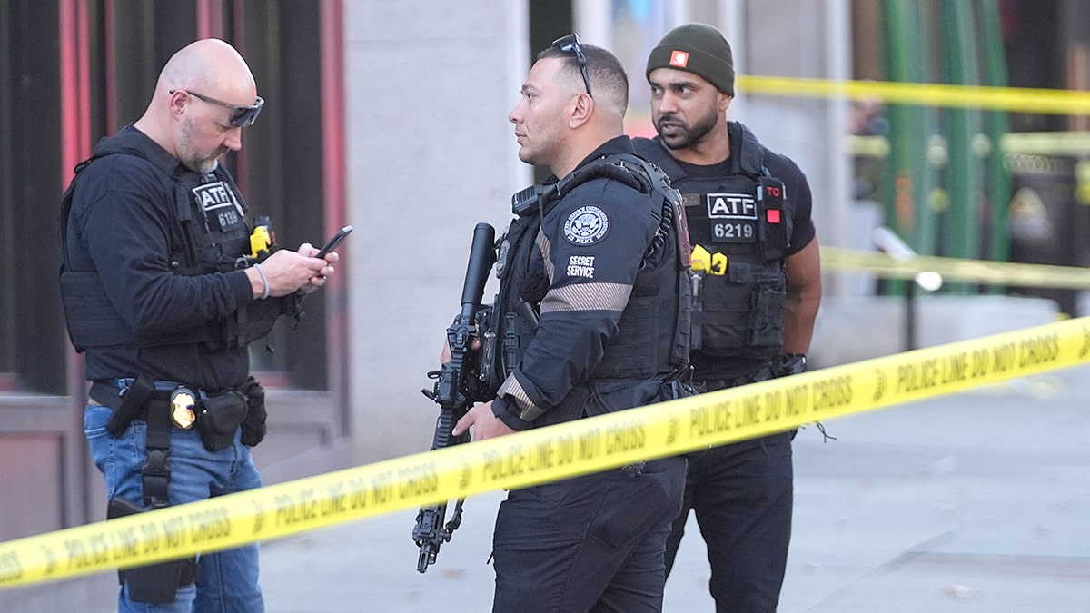Law enforcement stand together after National Guard soldiers shoot in DC