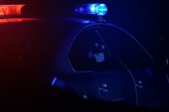 Armed Chicago Homeowner Confronts Intruder in Garage, Suspect Shot in Calf