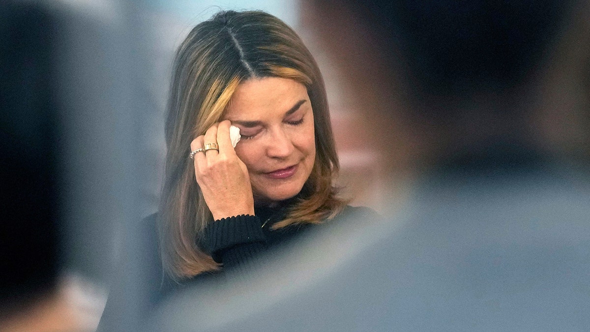 Savannah Guthrie standing on the Today show set at Rockefeller Plaza.