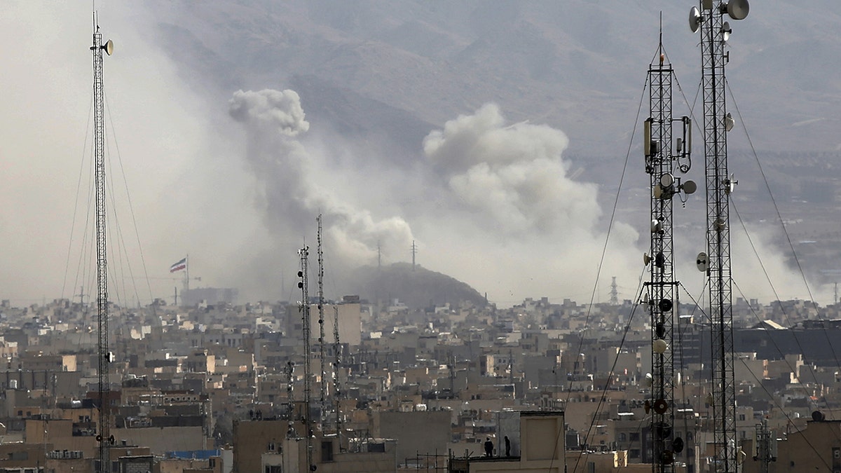 Smoke rising over Tehran