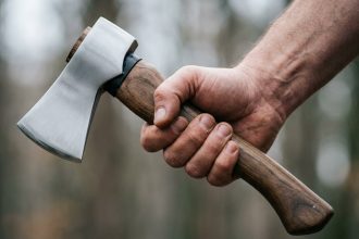 Oregon Apartment Resident Shoots Axe-Wielding Intruder Trying to Break Through Door