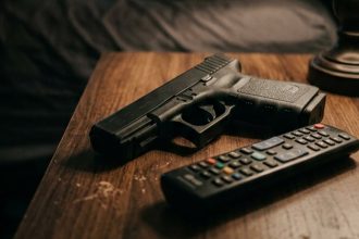Nashville Man Watching TV in Bed Shoots Masked Intruder Who Demanded Money