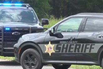 Passenger Fires Two Shots in Alabama Road Rage After Sanitation Worker Points Gun at Driver’s Back